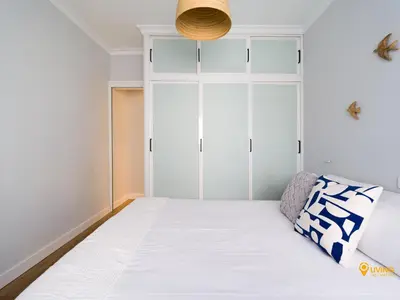 Cama o camas de una habitación en Living Las Canteras Homes - SEA BREEZE BEACHFRONT