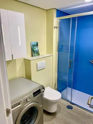 Un baño de Tamaran 102 - Luxury Garden Apartment