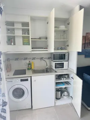 Una cocina o zona de cocina en Cozy apartment - KOKA