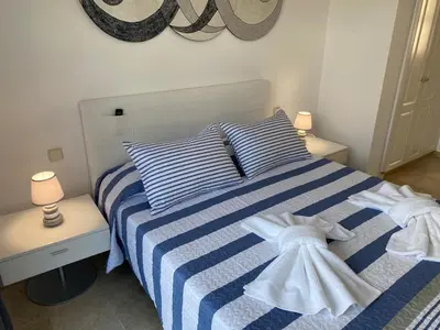 Cama o camas de una habitación en Seaside Miramar
