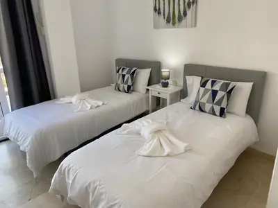 Cama o camas de una habitación en Seaside Miramar