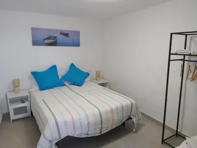 Cama o camas de una habitación en La casita blanca del mar