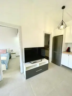 Una televisión o centro de entretenimiento en Villa Paraiso