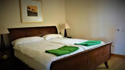Cama o camas de una habitación en VILLA DE LUXE 5***** golf - piscine chauffée - home cinéma - billard