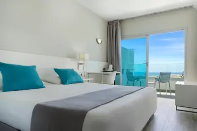 Cama o camas de una habitación en Hotel Caserio