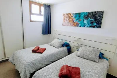 Cama o camas de una habitación en mirador del 6th by CASAS COCODRILO