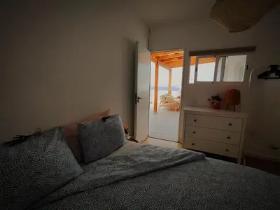 Cama o camas de una habitación en Nueve Pies Surf casita