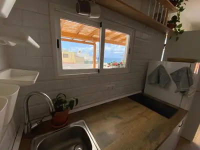 Una cocina o zona de cocina en Nueve Pies Surf casita