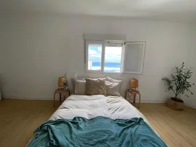 Cama o camas de una habitación en Nueve Pies Surf casita