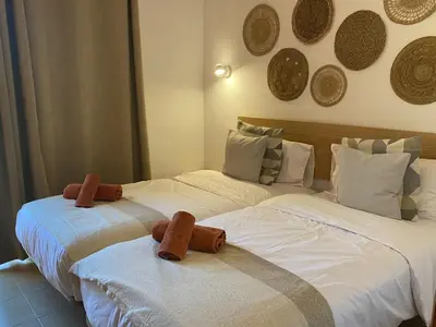 Cama o camas de una habitación en Casa Ilian Vibbecanarias Duplex en Maspalomas