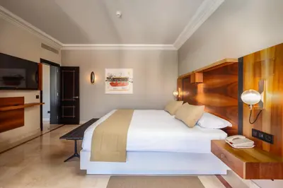 Cama o camas de una habitación en Lopesan Costa Meloneras Resort & Spa
