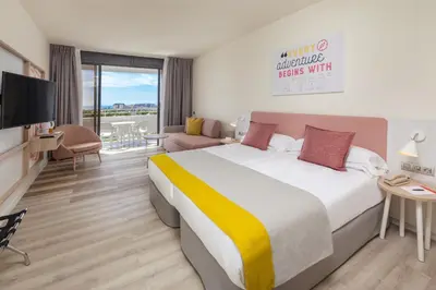 Una televisión o centro de entretenimiento en Abora Buenaventura by Lopesan Hotels