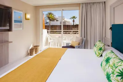 Cama o camas de una habitación en Corallium Dunamar by Lopesan Hotels - Adults Only