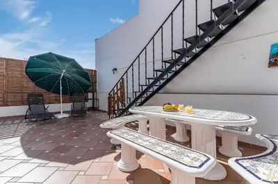 Un balcón o terraza de Home2Book Charming Attic El Rincón de Telde, BBQ