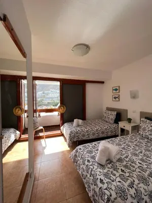 Cama o camas de una habitación en Guayana 23 beach apartment