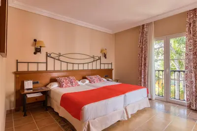 Cama o camas de una habitación en Hotel Cordial Mogán Playa