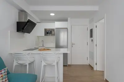 Una cocina o zona de cocina en Petit Accommodation Las Canteras Premier