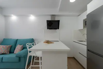 Una cocina o zona de cocina en Petit Accommodation Las Canteras Premier
