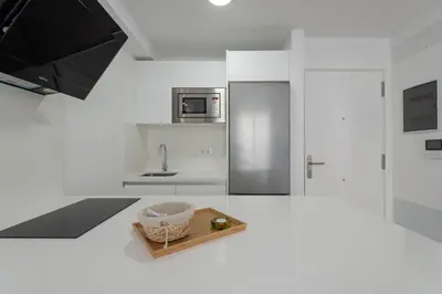 Una cocina o zona de cocina en Petit Accommodation Las Canteras Deuxième