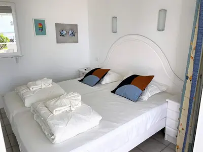 Cama o camas de una habitación en Bungalow Monte Golf