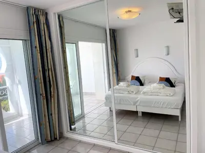 Cama o camas de una habitación en Bungalow Monte Golf