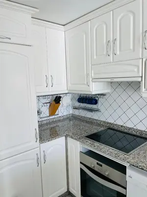 Una cocina o zona de cocina en Bungalow Monte Golf