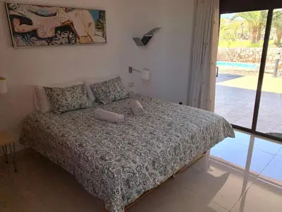 Cama o camas de una habitación en Zen Villa Anfi Tauro Golf with private heated pool