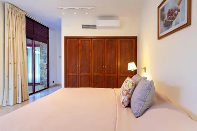Cama o camas de una habitación en Zen Villa Anfi Tauro Golf with private heated pool