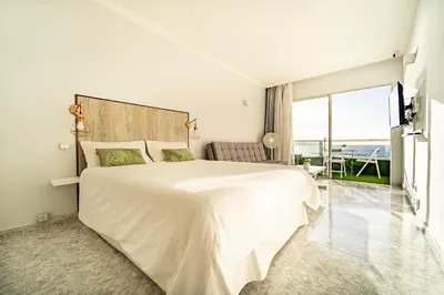 Cama o camas de una habitación en El 5º Cielo