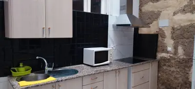 Una cocina o zona de cocina en Suite Tati