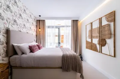 Cama o camas de una habitación en Coral Canteras Loft by Gestión Vacacional Canarias