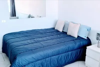 Cama o camas de una habitación en VV El Camarote de Playa Chica ¨by henrypole home¨