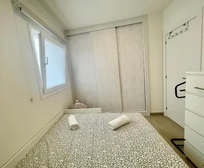 Cama o camas de una habitación en Blue Sky City Apartment
