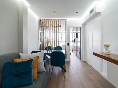 Zona de estar de Playa y diseño Las Canteras - SUITE 26