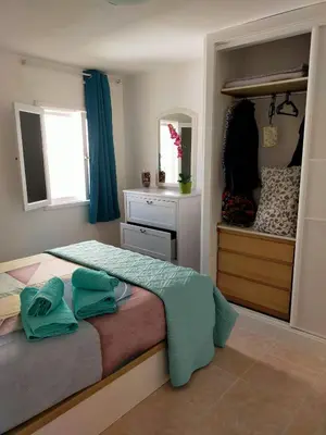 Cama o camas de una habitación en Sol y Mar Puerto Paraiso