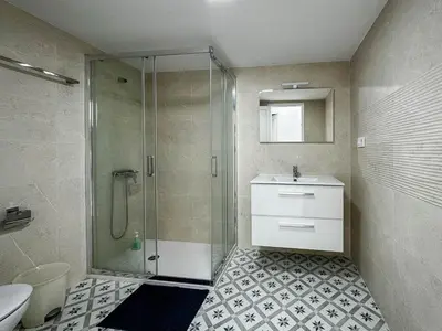 Un baño de Apartamento cerca de la playa