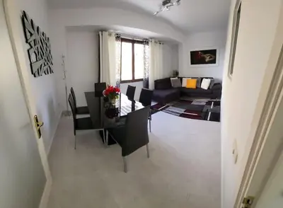 Una televisión o centro de entretenimiento en Apartamento Playa Grande