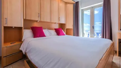 Cama o camas de una habitación en Bahia Holiday Club - Deluxe Private Suite - Puerto Rico