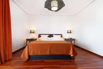 Cama o camas de una habitación en La Ideal Mansion by VillaGranCanaria