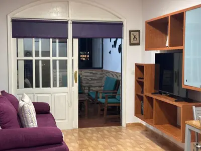 Zona de estar de Tommy´s House Vibbecanarias Playa del Cura