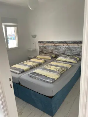 Cama o camas de una habitación en Residencia MIRAPUERTO