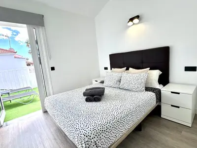 Cama o camas de una habitación en New Garden Solarium Bungalow