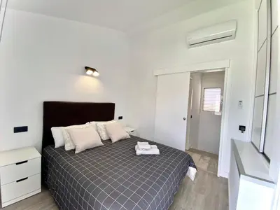 Cama o camas de una habitación en New Garden Solarium Bungalow