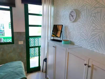 Una televisión o centro de entretenimiento en DunaFlor Verde active & chill Bungalow
