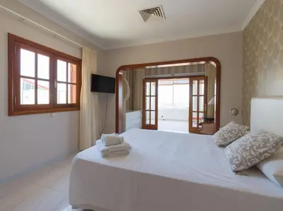 Cama o camas de una habitación en Sonnenland Hill Villas