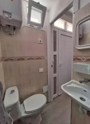 Un baño de MINI estudio El Reloj