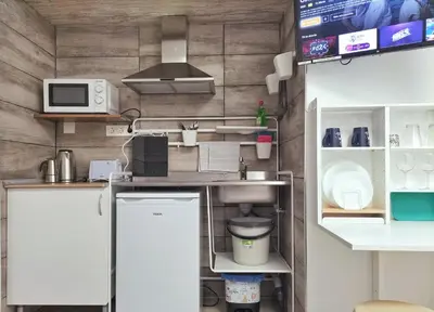 Una cocina o zona de cocina en MINI estudio El Reloj