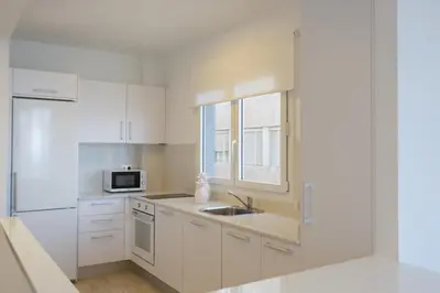 Una cocina o zona de cocina en Apartamento frente a la playa de Las Canteras S2