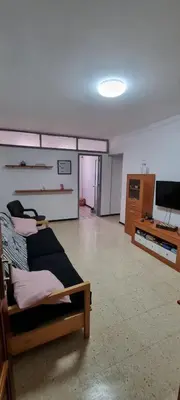 Una televisión o centro de entretenimiento en vivienda Acerina