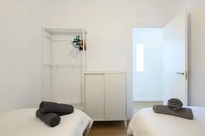 Cama o camas de una habitación en HJS Plaza Suites Apartments II